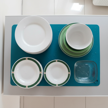 Plates drying on the teal mat