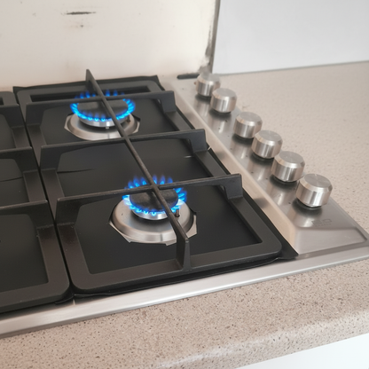 Professional product photo of the gas hob with blue flames
