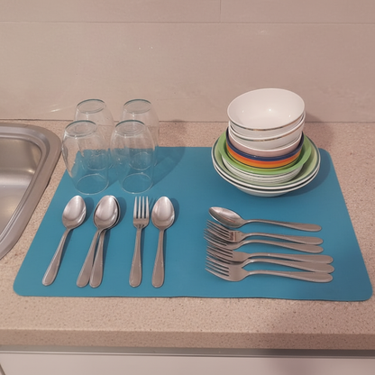 Professional product photo of the teal dish drying mat